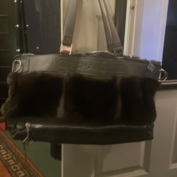 Chanel Bag With Fur. Great For A Purse Or Travel Bag. Only Used One Time.comes With A Chanel Bag For Storage!