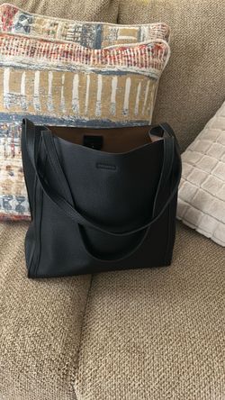 A beautiful leather black purse.