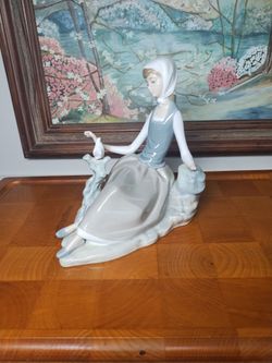 Porcelain Shepherdess Girl w dove Lladro # 4660... Marbach and 410 at 78227 or 1604