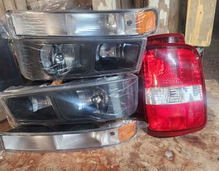 Taillights from a Ford F-150, and upper and lower headlights from a Chevy Express.