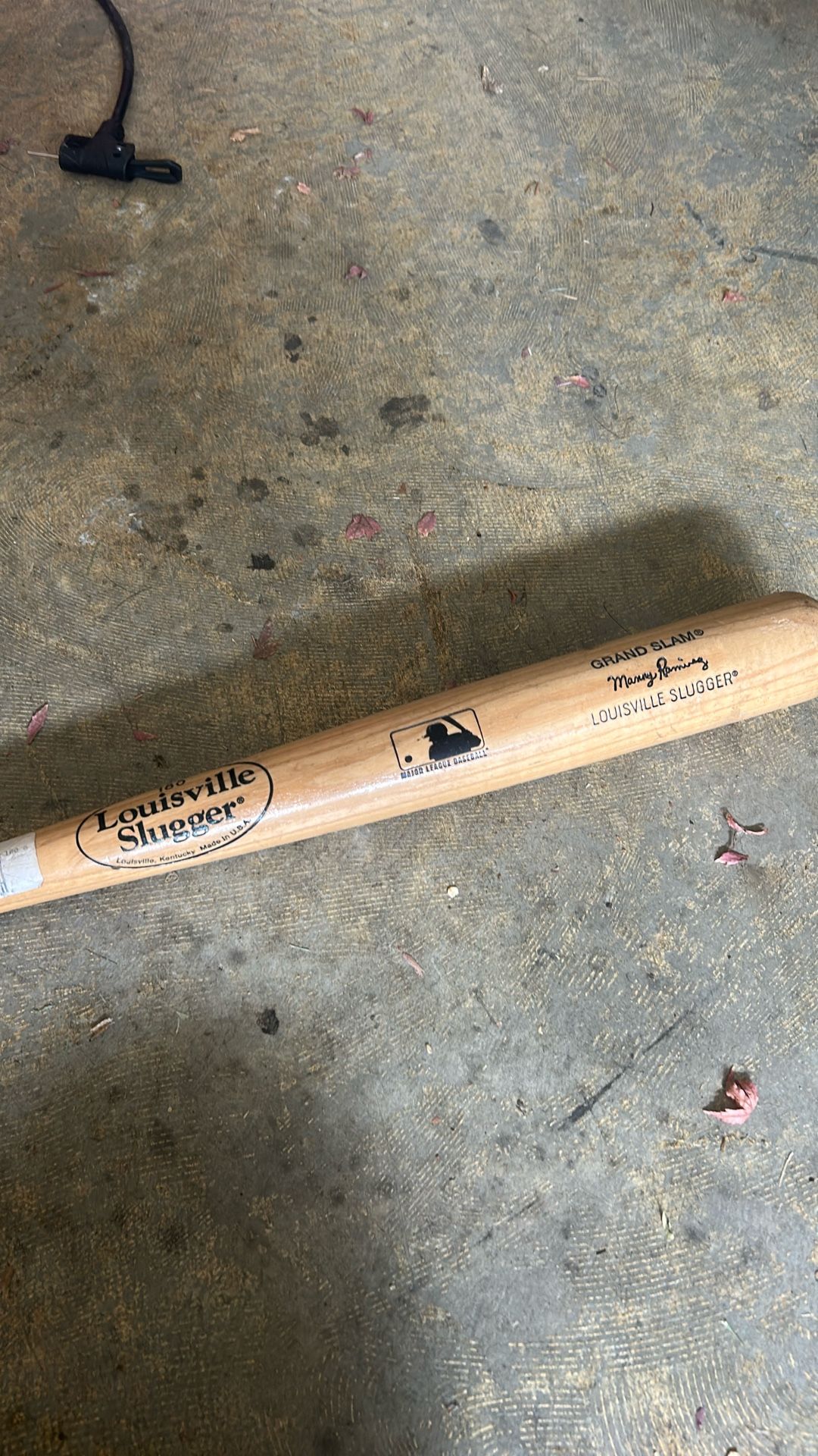 Vintage Louisville Slugger bat signed by manny ramirez