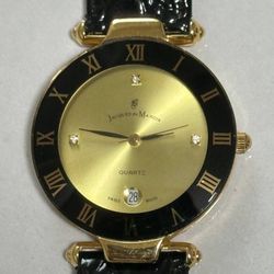 Vintage Jacques Du Manoir Roman Numerals And Date Black Gold Watch Swiss