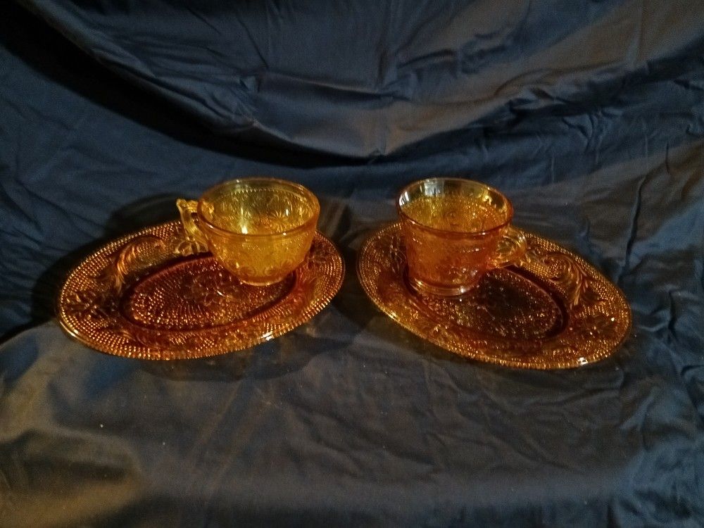 A Set Of Two Amber Antique Sandwich And Cup Plates