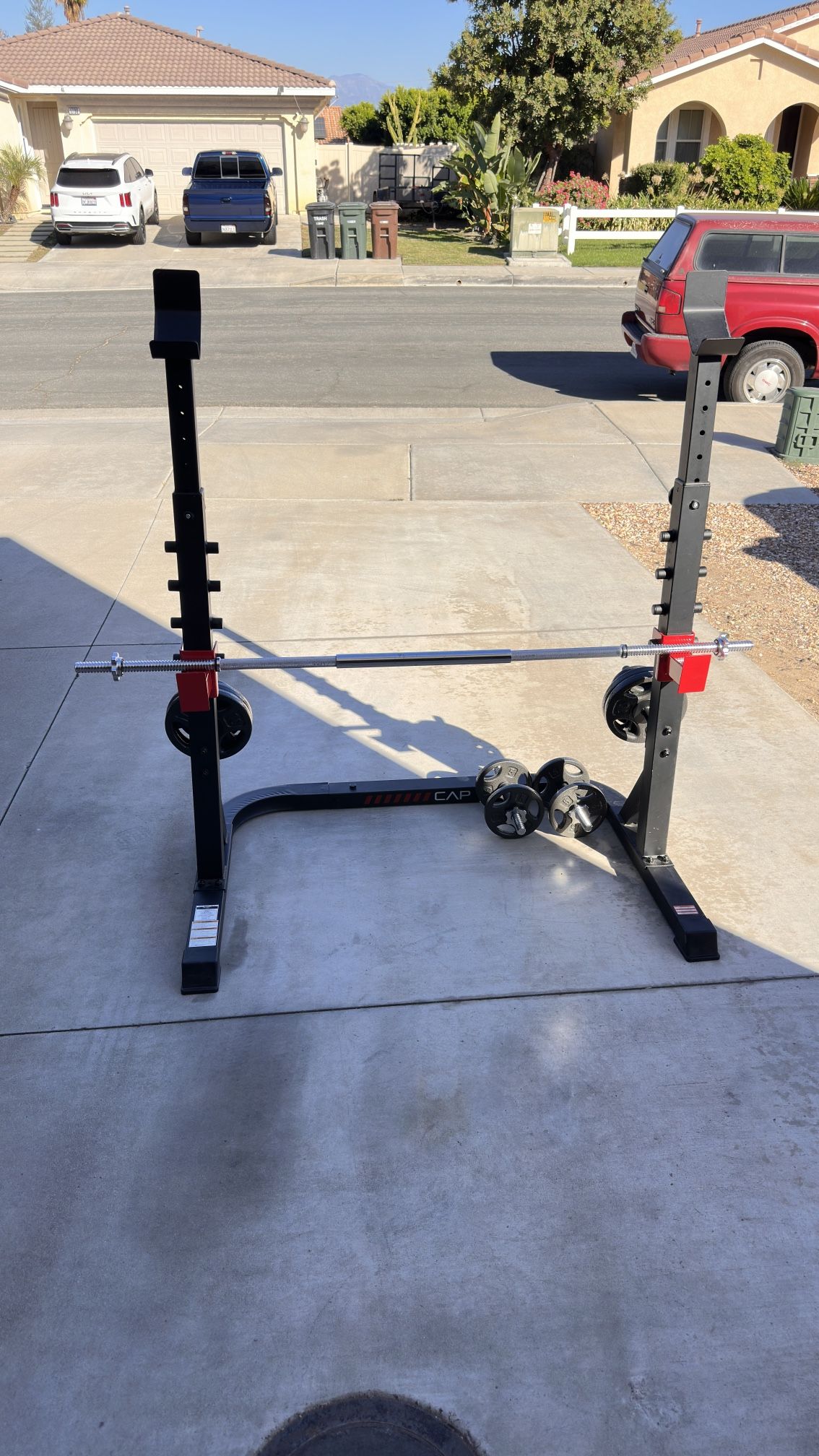Gym set , squats rack, weights, dumbbells,