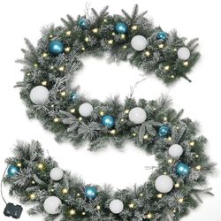 New OasisCraft Snow Flocked Christmas Garland 9 FT, Pre-lit Christmas Garland with Balls Battery Operated Xmas Garland with 50 Warm Lights 