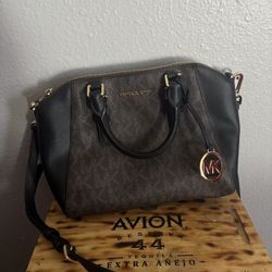 Michael Kors Ciara medium satchel bag in brown and black signature logo canvas with gold-tone hardware