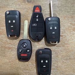 Keys And Remotes Llaves Y Controles Cut and Programmed On Site 