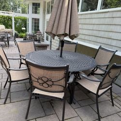 60” Outdoor Table And 6 Sling Back Chairs