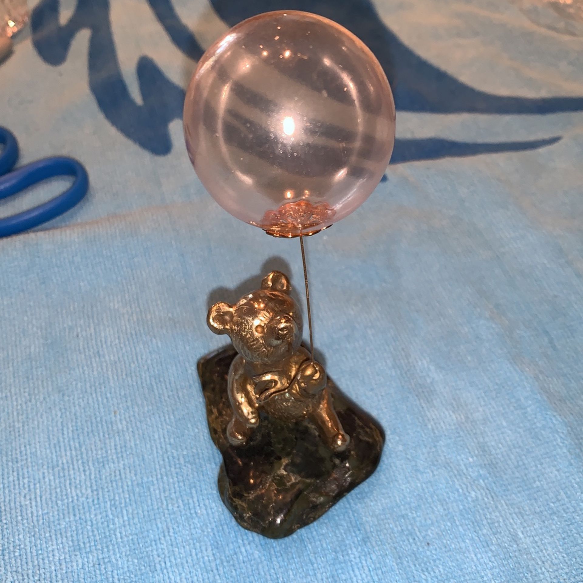 Malcolm Moran bronze bear sculpture with pink glass baloon