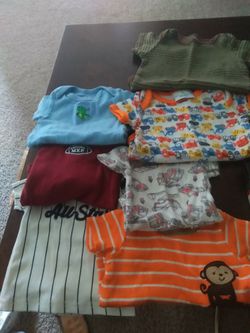 Baby boy clothes. Ranging size newborn to 9 months. Bunch of onsies pants and sleepers.
