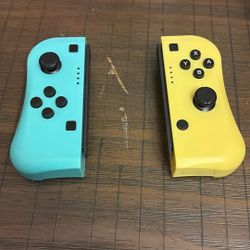 Nintendo Switch Joy-Con controllers, specifically featuring the Neon Blue left controller and the Neon Yellow right controller. 