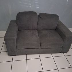 2 seater Grey Couch