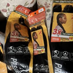 30 unopened packs of African Collection hair extensions & styrofoam head. Few extra that are open