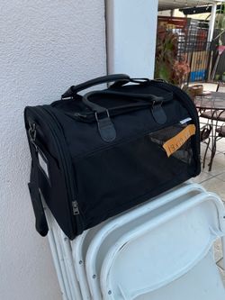 Film condition a small pet fabric carriers