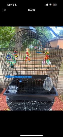 big birdcage with light and alot of Toys 