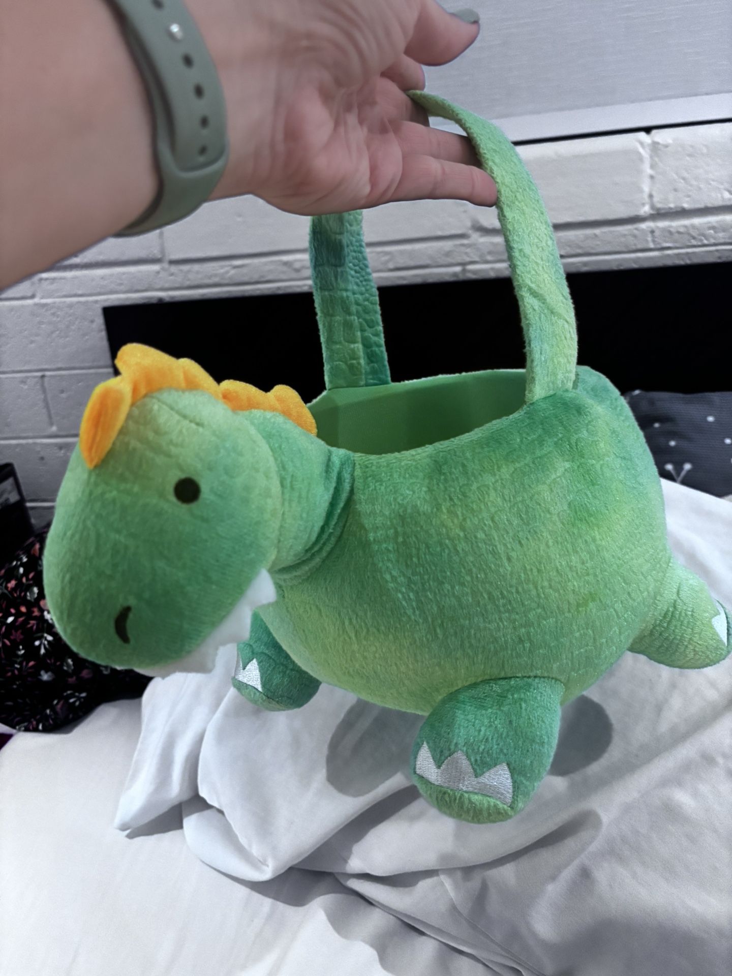 Plush dinosaur Halloween basket from spirit Halloween store