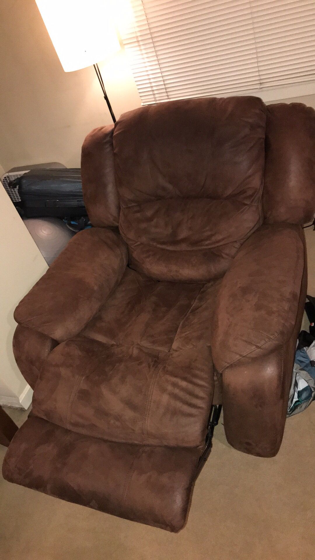 Large brown recliner chair