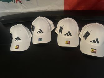 Adidas new  hats ($15 ea