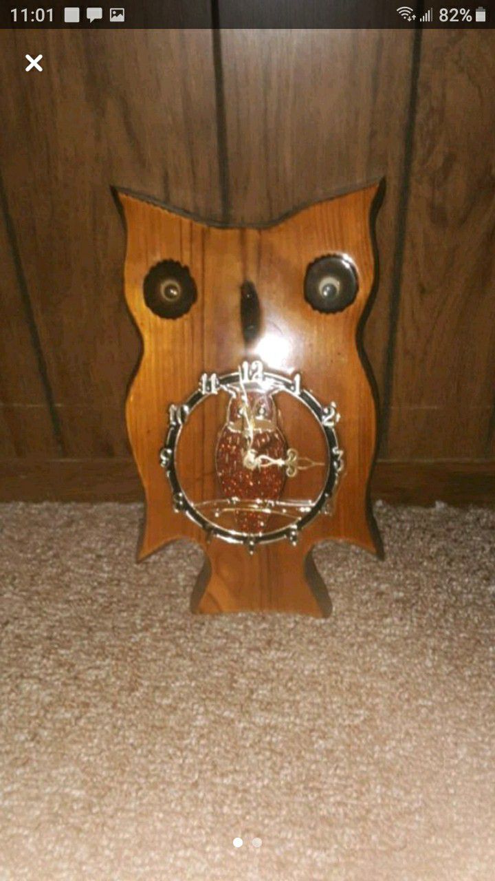 Antique wooden owl clock
