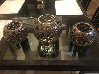 Chrome decorative vases.