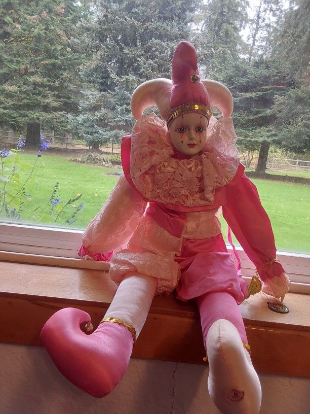 CLOWN MUSICAL PORCELAIN DOLL
