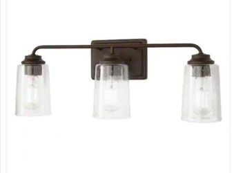 Hampton Bay Evangeline 23 in. 3-Light Modern Bronze Farmhouse Bathroom Vanity Light with Clear Seeded Glass Shades