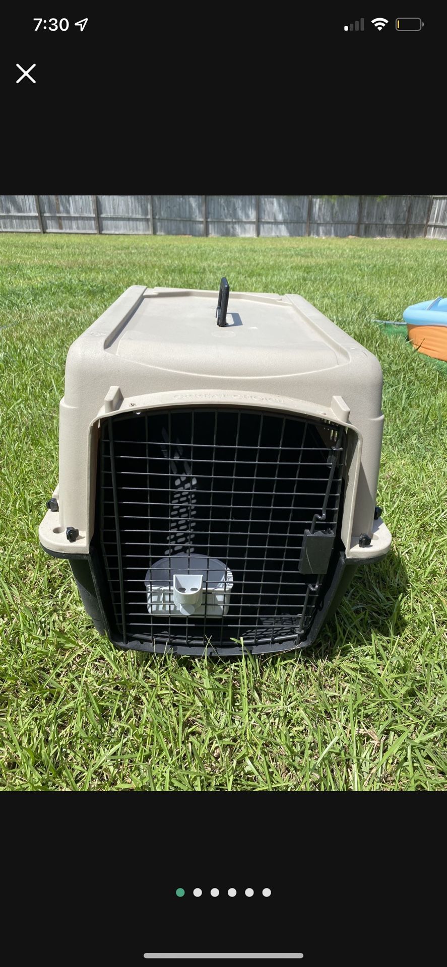 Dog travel Kennell with food bowl. Height 20” Width20” Lenght 28”