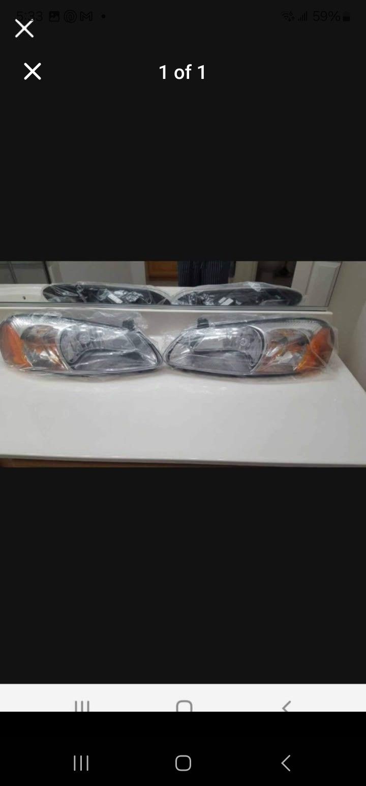 Chrysler Headlights Brand New For a 2005