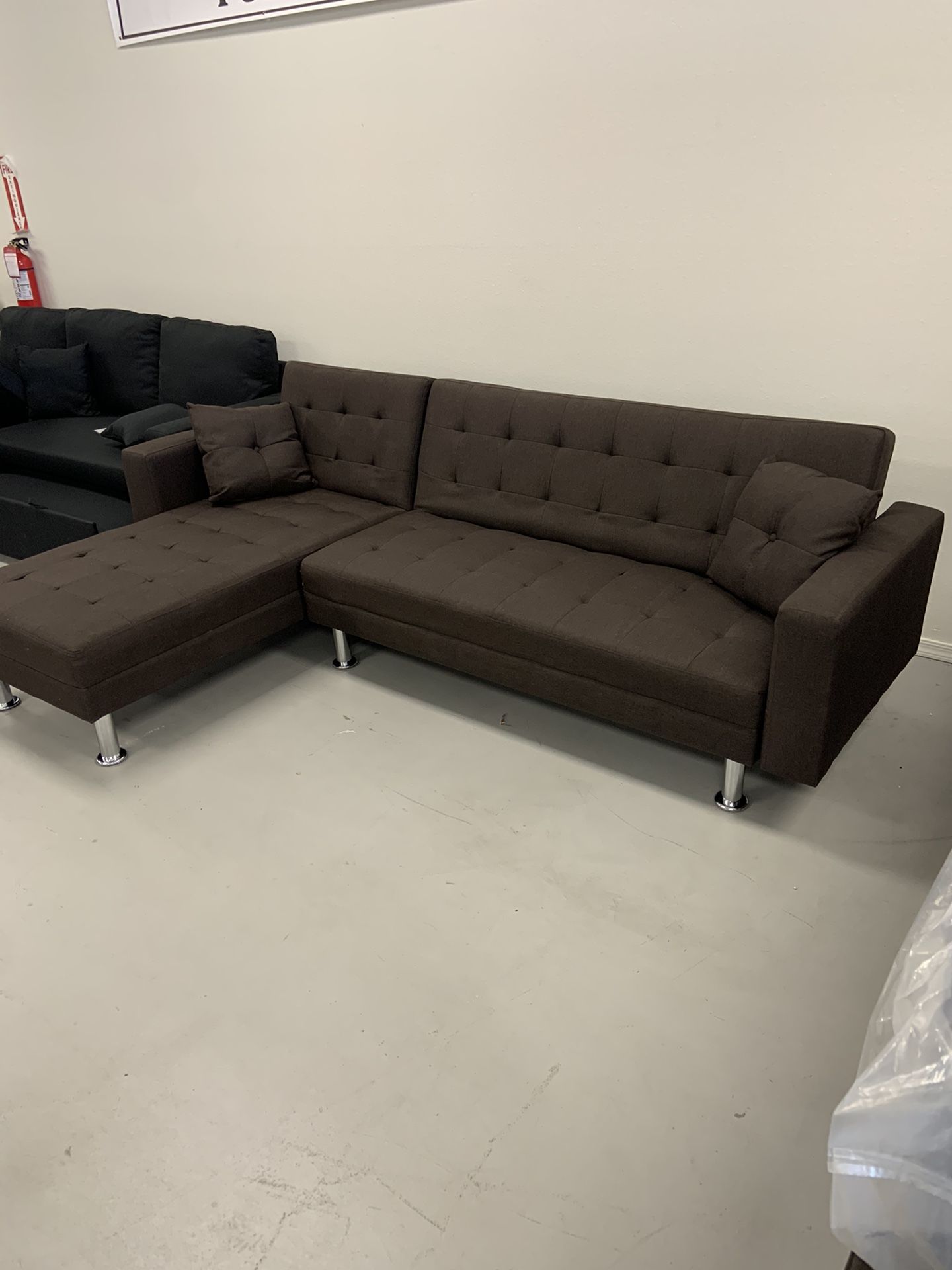 Brand New chocolate sectional,  reversible sleeper