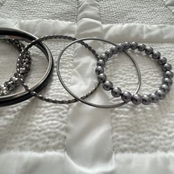 Black/Silver Tone Bangles.