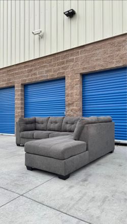 Ashley’s grey Sectional sofa couch with pullout bed !