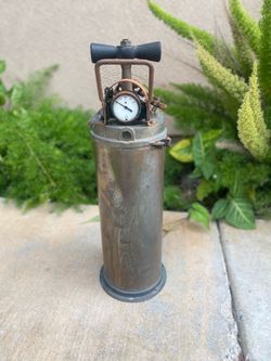 Selling a vintage brass fire extinguisher, missing spray nozzle, makes great decorations display  Asking only $95