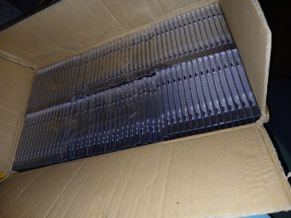BRAND NEW DOUBLE SIDED CD CASES QTY: 100