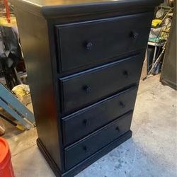 The dimensions are 18 deep 31 1/2 wide and 48 inches tall it’s a black stain four drawer tall boy dress dresser