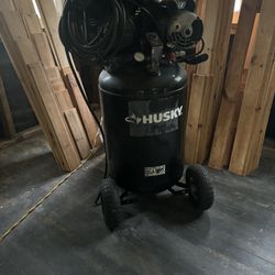 Husky 30 gal 125 volts, 15 amps draw. Single Stage.
