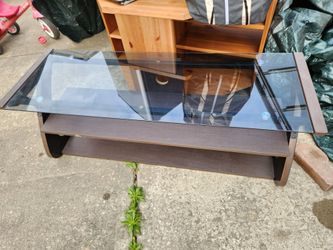 Like new  TV stand with glass top in excellent condition