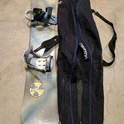 153cm Gerry Lopez  snowboard. Includes Burton bag.