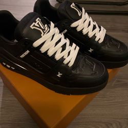Black Louis Vuitton sneakers with white laces #luxury #designer