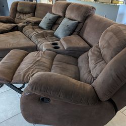 Brown Microfiber Couch, Three Panels, With Two Reclining Ends, Also Comes With An Ottoman For Storage.