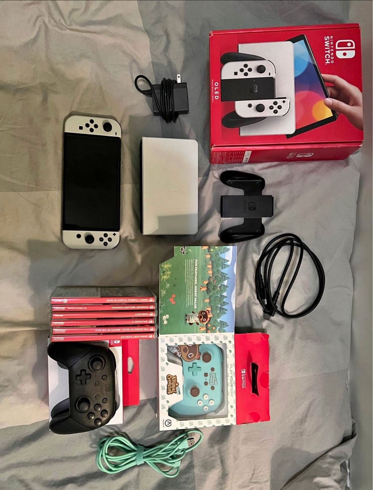 A Great Condition Switch Oled Console White 64 GB With Games + Pro Controller And More Bundle With It’s Include All The Accessories