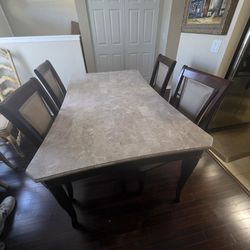 Dinning table with 4 chairs.