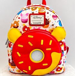 Brand new. Loungefly Disney Winnie the Pooh Donuts Allover Print Mini Backpack (NWT)