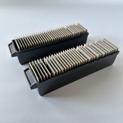 Photos With trays used to hold and feed slides into a compatible projector