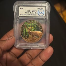 1 oz colorized copper round featuring a White-Tailed Deer