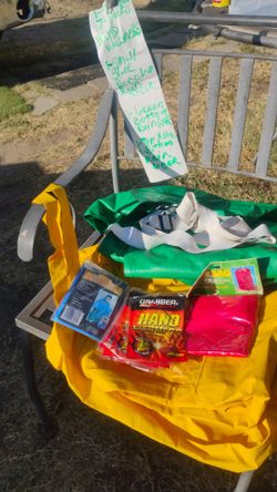1 yellow,Top & Bottom Heavy-Duty Rain Gear, 1Green Bottom Rain Gear,Heavy -Duty.1-$tuff Bag,I small blue pancho Rain gear & 7Packs o ft hand warmer