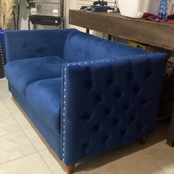 Two  suede sectional couches