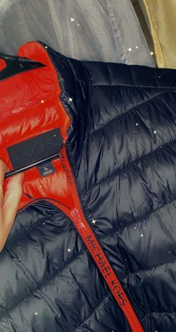 Michael Kors jacket size large can be for a man or woman ladies fits great with a little hoodie under