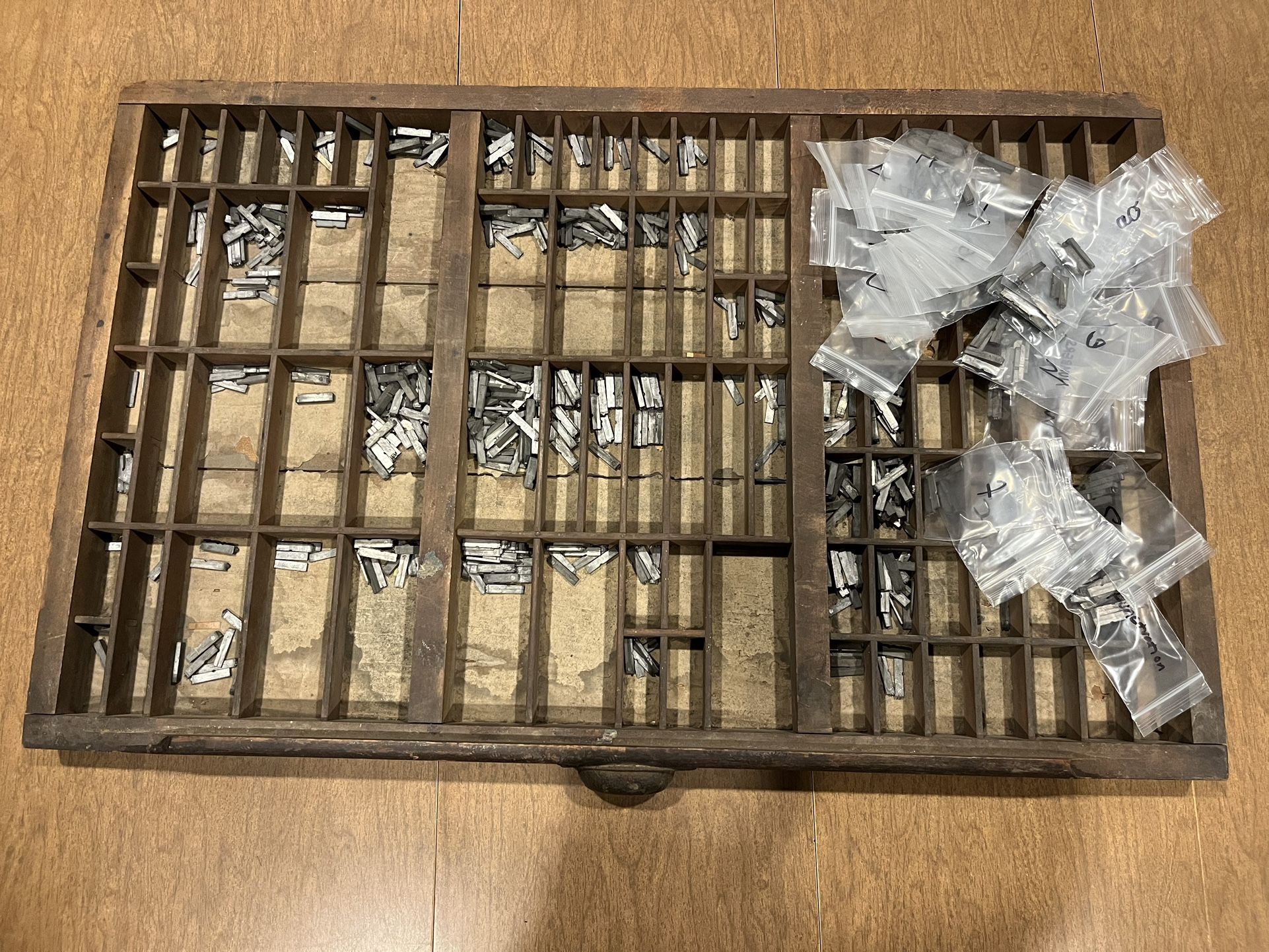 antique printer drawer with stamps 