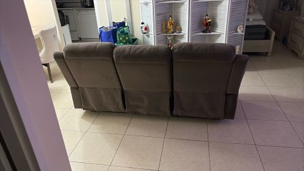Brown coach recliner for 3 seats