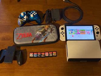Nintendo Switch OLED White with 7 games